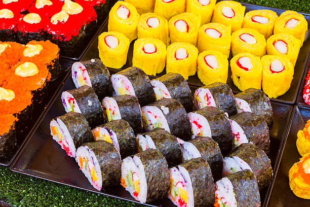 Sushi rolls on Thailand street food vender.