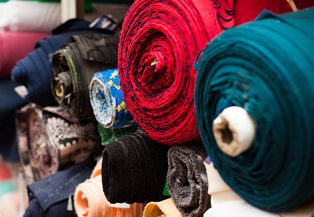 istock Rolls of fabric in stock 489518266