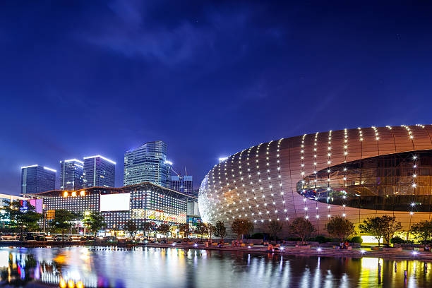 istock Illumintaed modern landmark and skyline at riverbank 489519030