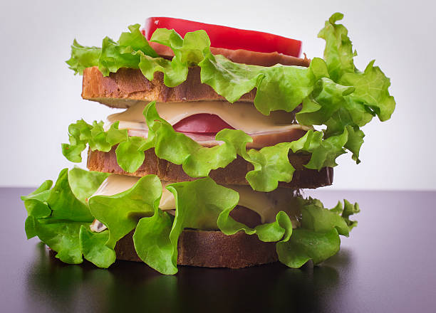 istock sandwich with tomato cheese and ham 489522492