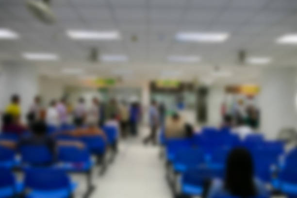 istock blurry defocused image of people waiting to see doctor 489524668