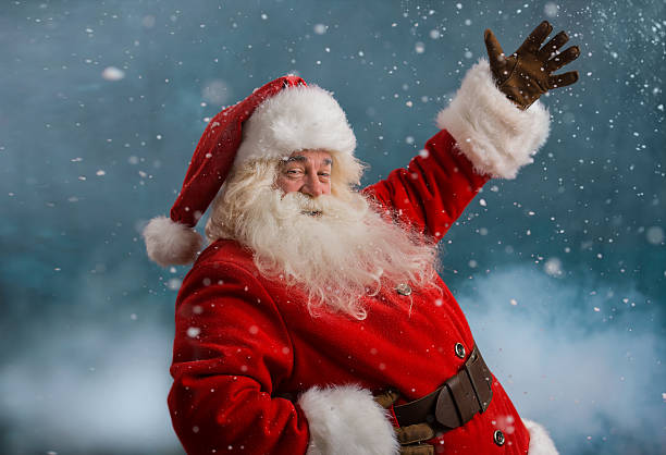istock Happy Santa Claus laughing 489525250