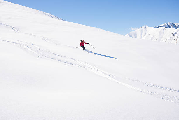 istock Freeriding on fresh powder snow 489525858
