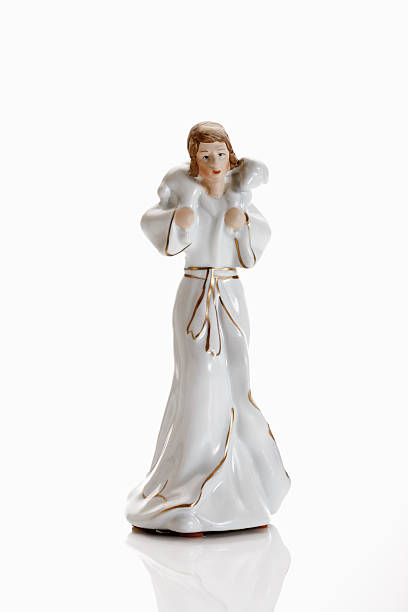 istock Christmas decoration, crib figurine, shepherd with lamb 489525862
