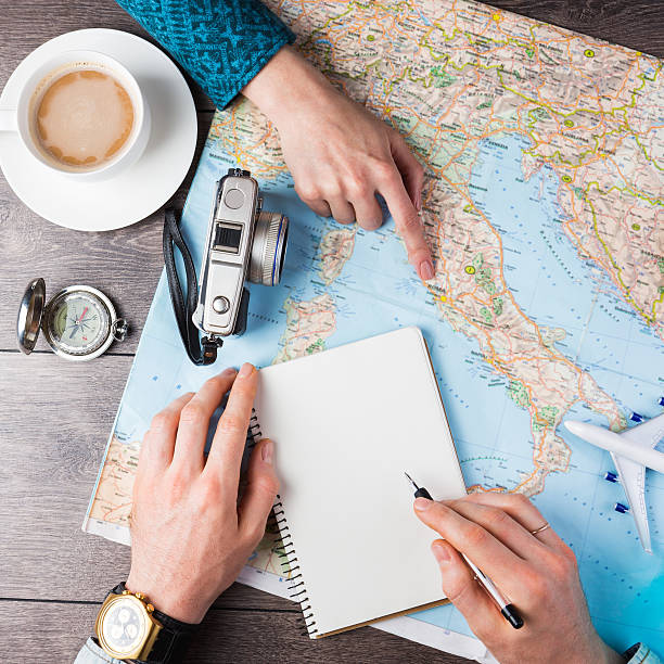istock Two young people together planning trip to Europe. 489526034