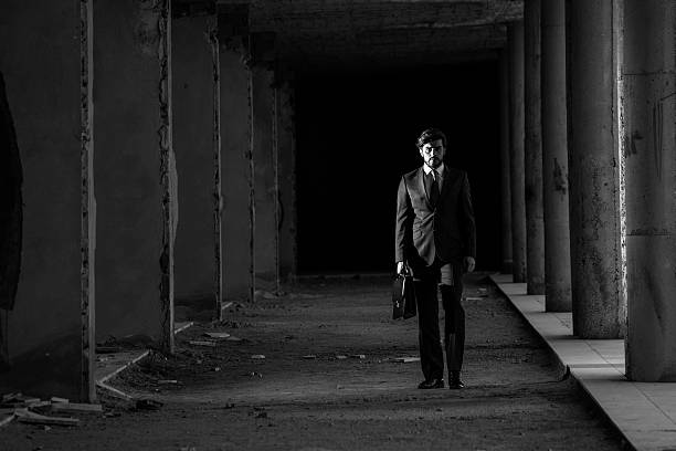 istock Lonely Businessman In Abandoned Modern Building 489526550