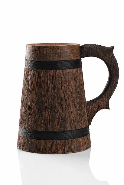Wooden beer mug isolated on a white background. File contains path to cut.