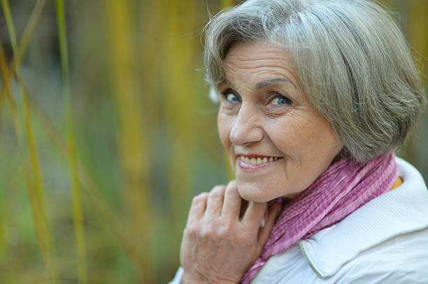 istock Portrait of happy eldery woman 489528590