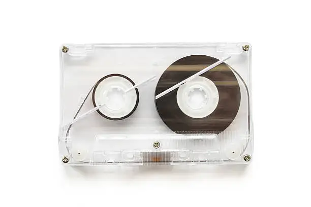 Transparent audiocassette on white background