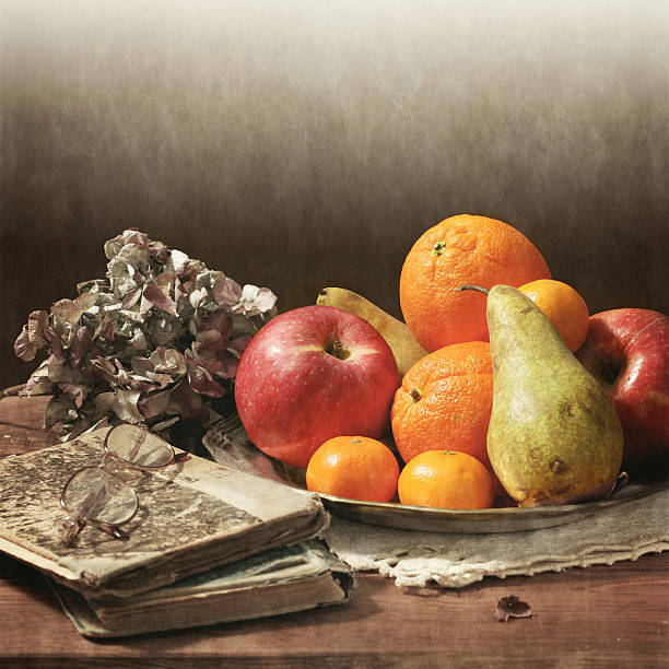 istock Still life, apple and candle, Vintage. 489542701