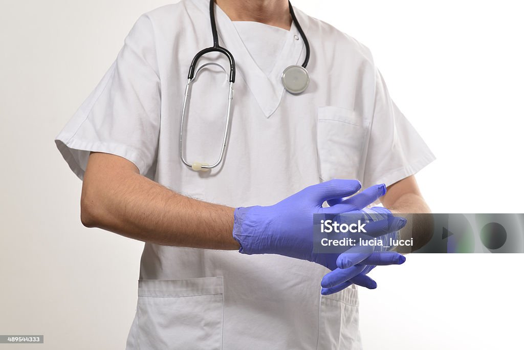 Doctor with protective gloves Adult Student Stock Photo