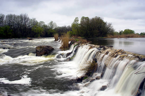 istock Threshold of the mountain river and wet stones 489545491