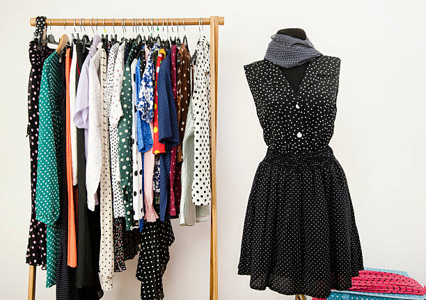 istock Colorful wardrobe with polka dots clothes and accessories. 489545973
