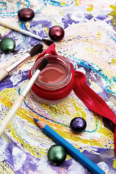 istock oil paint four colors and old brush 489546423