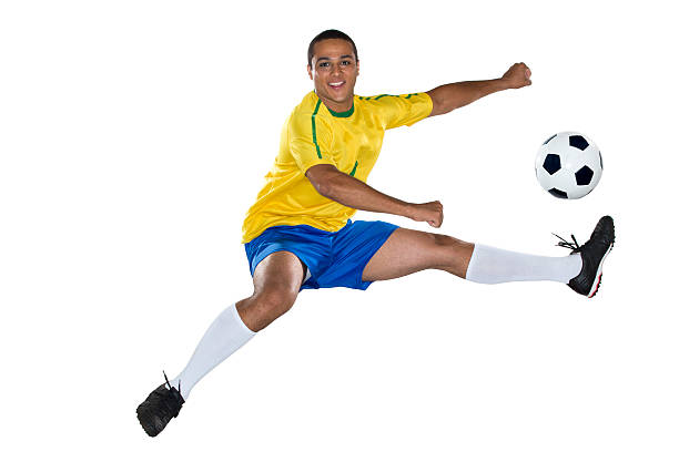 istock Brazilian Soccer player, jumping, yellow and blue 489546621