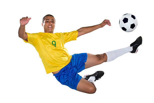 istock Brazilian Soccer player, jumping, yellow and blue 489546683