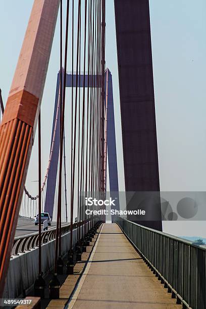 Bicycle Lane On A Suspension Bridge At Morning Stock Photo - Download Image Now - Bridge - Built Structure, Abstract, Architecture