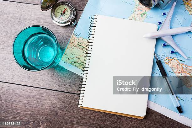 Travel Theme Tools Stock Photo - Download Image Now - Travel, World Map, Book