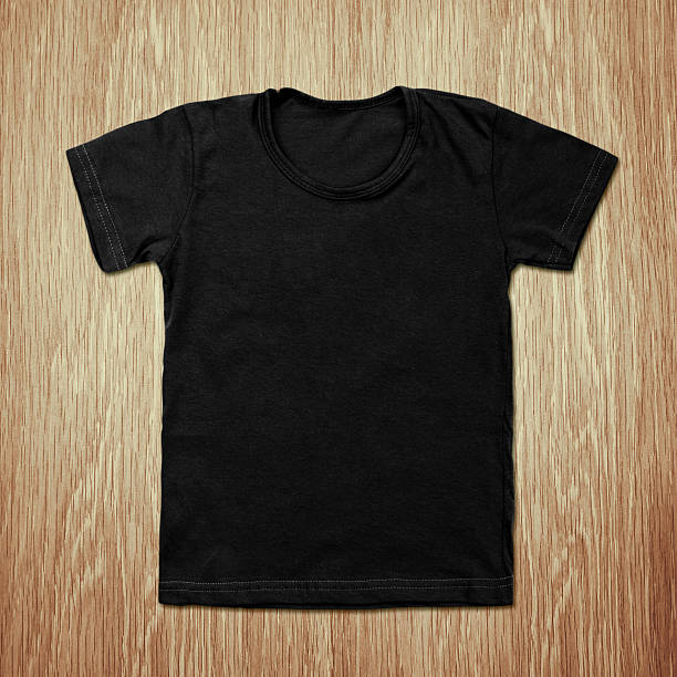 istock Black blank t-shirt on wooden background 489554328