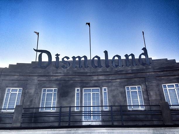 Dismaland Entrance Weston-Super-Mare, UK - September 21, 2015: The entrance to The Banksy Art Exhibition Dismaland on the seafront in Weston. banksy stock pictures, royalty-free photos & images