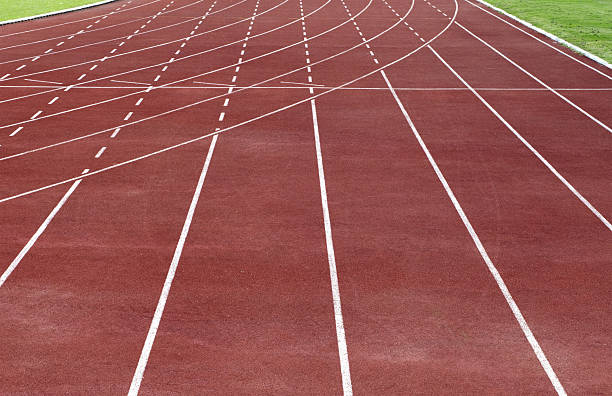 istock Direct athletics Running track  at Sport Stadium 489556208