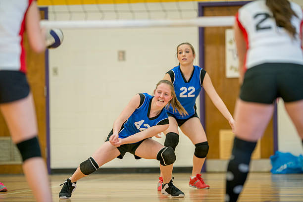 istock Woman Diving for Volleyball 489557340