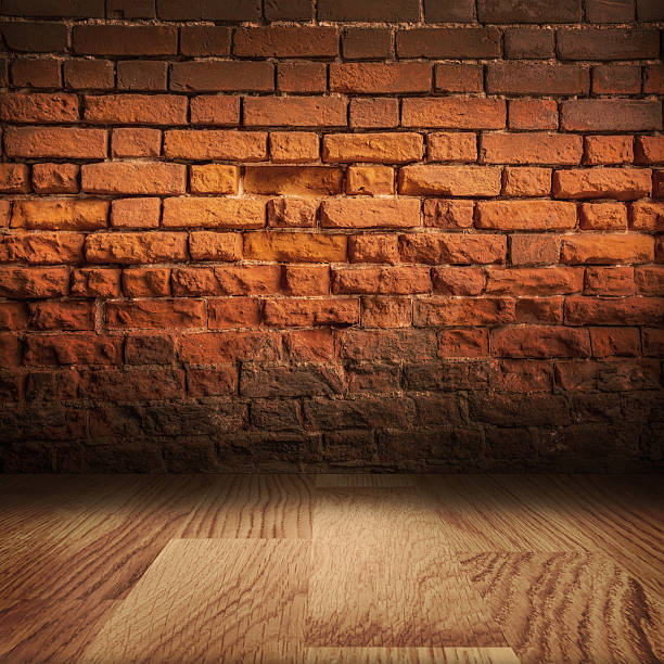 istock Grungy brick wall with wooden floor 489557488