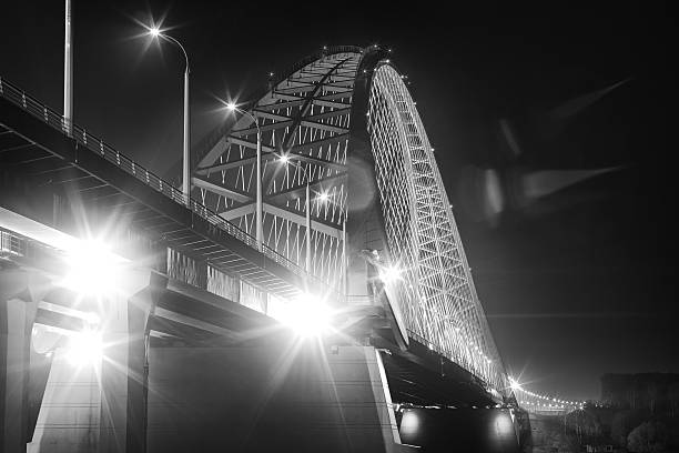 istock Abstract black and white photo. Traffic on night bridge. 489559546