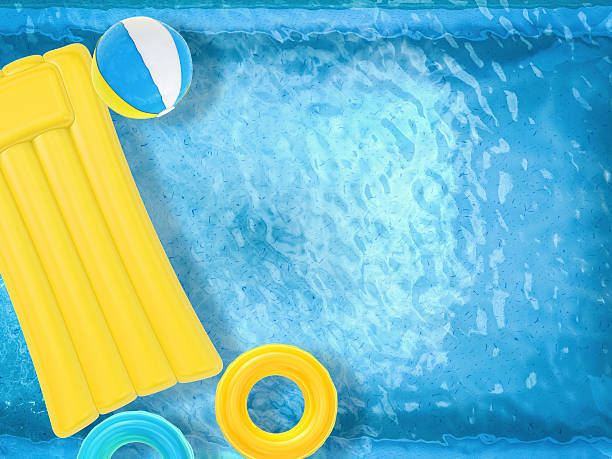 istock summer fun with inflatable toys floating on pool top view 489560000