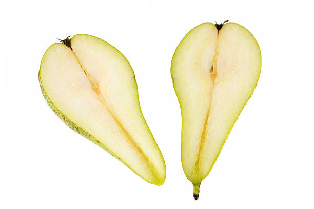istock Two cutted half of green pears. 489560798