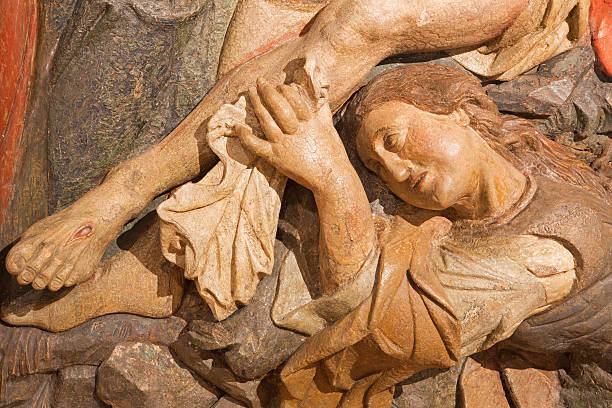Banska Stiavnica -  carved statue of Pieta (Mary Magdalen) detail Banska Stiavnica - The detail of carved statue of Pieta (Mary of Magdala) as the part of baroque Calvary from years 1744 - 1751 by Dionyz Stanetti. pieta stock pictures, royalty-free photos & images