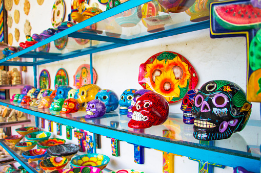 Traditional Mexican souvenir skulls on the market. Travel background for Mexico, Latin America.