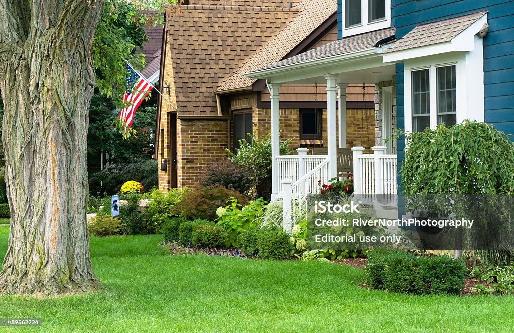 Middle Class American House in Rochester, Michigan Rochester, Michigan, USA - September 20, 2015: A quaint house in a leafy neighborhood of Rochester, Michigan. Rochester is a bedroom community of Detroit, Michigan, with many residents employed by the automotive industry. It has been named one of the best places to live by Money Magazine. Michigan Stock Photo