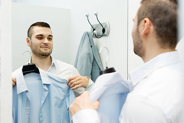 istock man in the dressing room 489562518