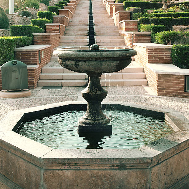  Close up of a public fountain at the park.