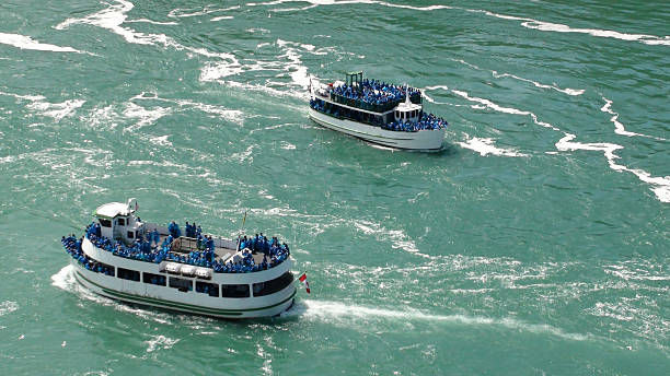 istock Niagara Falls Boat From Canadian Side With Canadian Flag 489565368