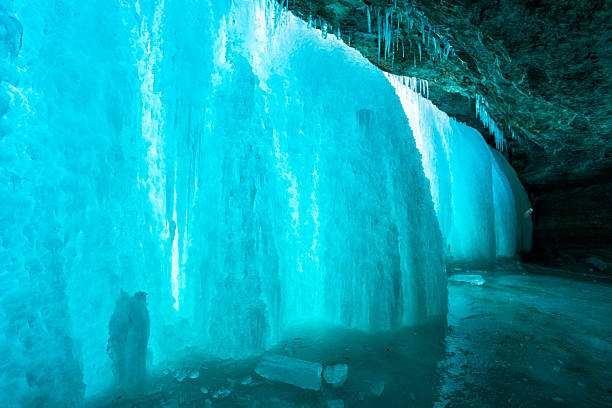 istock Turquoise tinted frozen waterfall 489566142