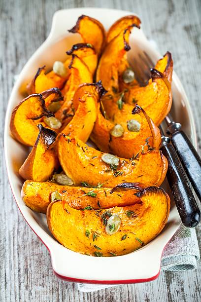 istock baked pumpkin with thyme and seeds 489567496