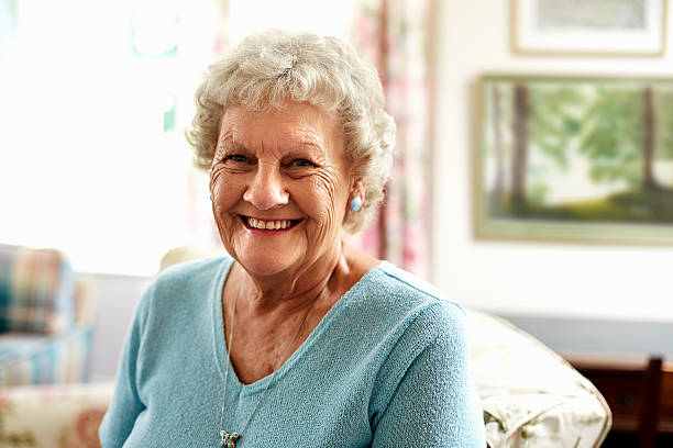 portrait of happy senior woman - donne anziane foto e immagini stock