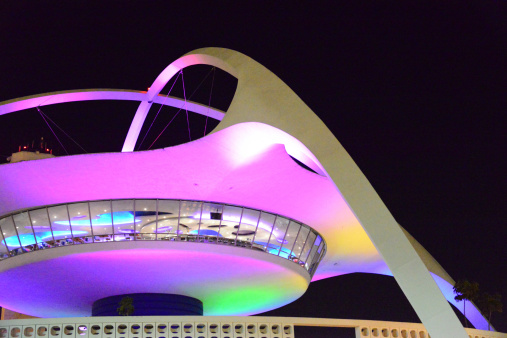 Los Angeles, California, USA: curves of Los Angeles International Airport at night - flying saucer theme building - LAX - photo by M.Torres