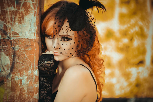 istock red-haired young woman 489587147