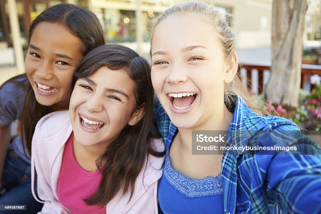 Group Of Girls Hanging Out In Mall Together Group Of Girls Hanging Out In Mall Together Smiling And laughing To Camera Teenage Girls Stock Photo