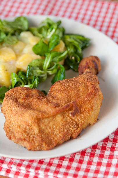 istock Grilled Chicken Legs with salad 489590521