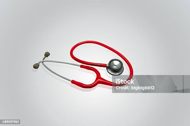 Red Stethoscope In Gray Background Stock Photo - Download Image Now - Backgrounds, Blue, Blue Background