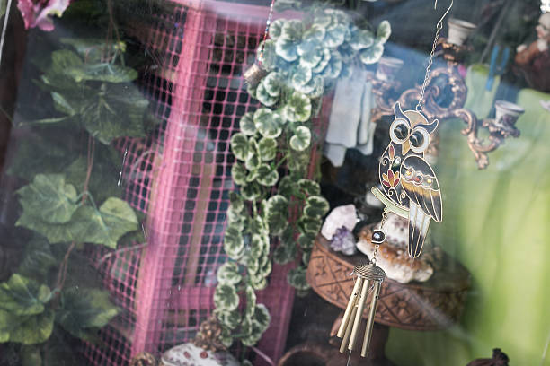 Window store with an iron owl ornament