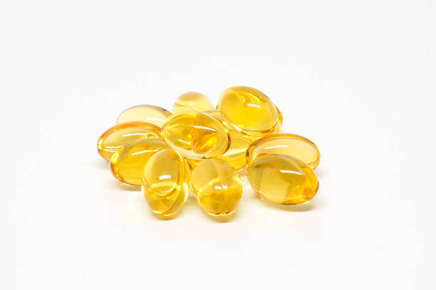 istock Omega 3 capsules for dieting concept on white background 489599560