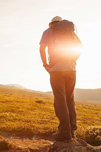 istock hiker with backpack travelling in Norway mountains Dovre 489599920