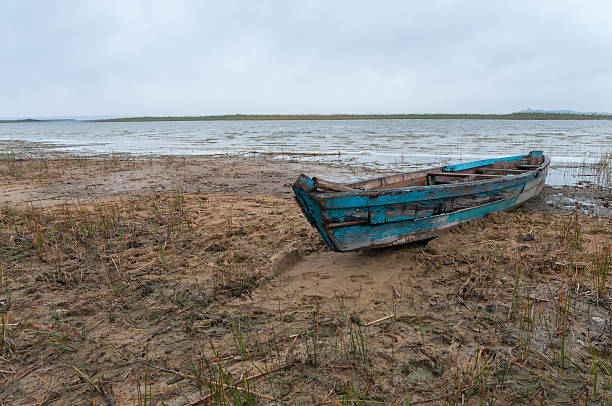 istock Old wooden boats ashore 489601140