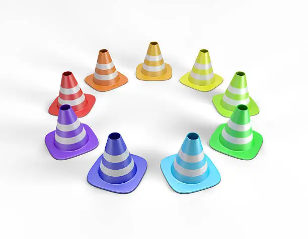 Colored traffic cones arranged in a circle. High quality 3D illustration including a clipping path.