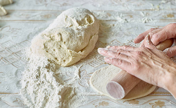 istock Kitchen, cooking pies with dough on the table 489606126